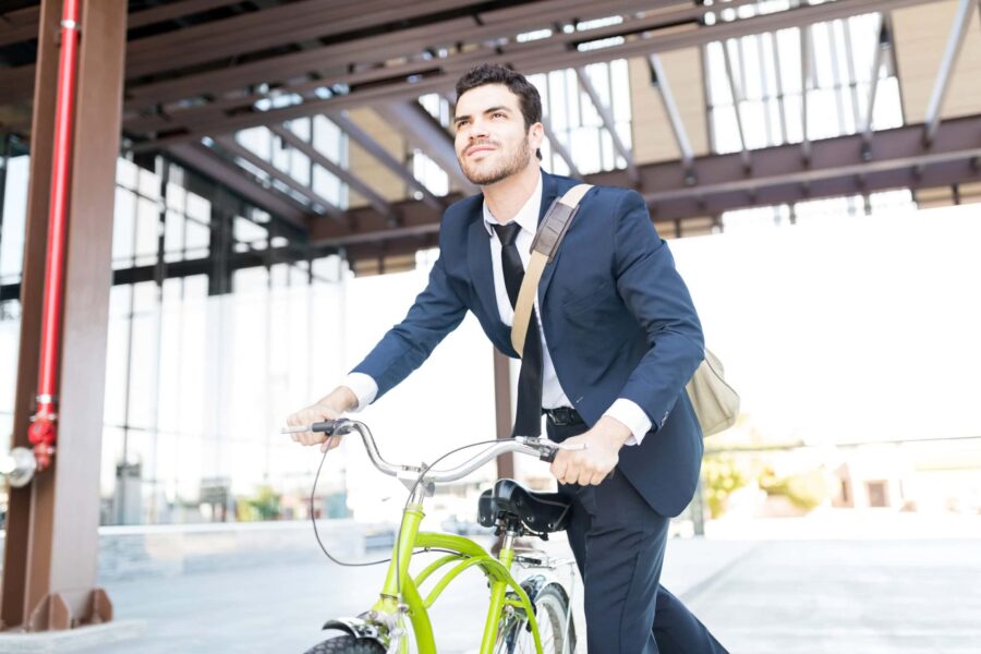 Confident Man In Formal Clothes Commuting To Office Nakup kolesa za opravke po mestu. Kaj pa davki?